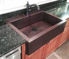 Disassemble the drain by removing the threaded tail piece, rubber sealing gaskets, friction washer and lock nut from the drain body. Custom Made Copper Kitchen Sinks Www Coppersinksdirect Com