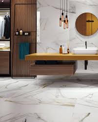 If you're looking at solid calacatta gold marble you'll be paying a premium for the slabs. Wall Tile Calacatta Gold Brillo 31 6x100 Colorker