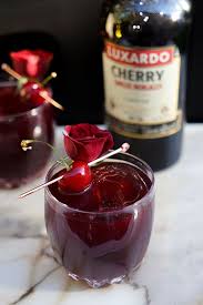 A Summery Cherry Punch Made With H By Hine Cognac Luxardo Sangue Morlacco Cherry Liqueur Port Fresh Lemon Ju Cherry Drink Cherry Punch Recipe Cherry Liqueur