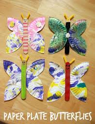 A Marbled Paper Plate Butterfly Craft Butterfly Crafts Preschool Crafts Daycare Crafts