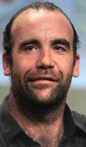 Character actor David McNally. He played Hanno in the episode Cor-Ai and  Simon in the episode Demons.