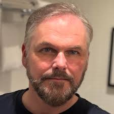 Looking for a wedding band that doesn't charge the absolute earth. Ideally  with some rocky