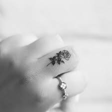 Pin By Jessica Johnson On Tattoos Tiny Rose Tattoos Tattoos Hand Tattoos