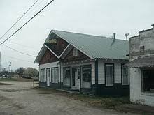 Patrons gathered around a bar, the shuckers shucking raw and steamed oysters and that was that. Sunny Side Inn Wikipedia