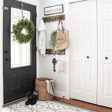 hello everyone wanted to quickly share a shot of our front entry way we made only a few small changes here modern farmhouse entryway foyer decorating home