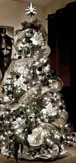 A rustic christmas tree theme is perfect for the rural home or cabin in the woods. Black White Silver And Gray Christmas Tree Silver Christmas Tree Decorations Silver Christmas Tree Grey Christmas Tree