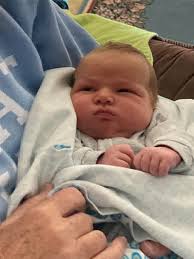 I'd like to introduce my daughter Nora Elizabeth Joanne. Born April 23rd,  2022 at 12:42am via C-section. She's the most relaxed baby. : r/Mommit