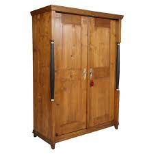 Is your teen tired of their cramped closet? Austrian 18th Century Empire Style Two Doors Larch Wood Armoire Wardrobe Cabinet For Sale At 1stdibs