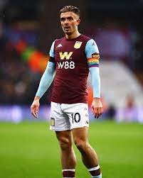 A birmingham fan attacking jack grealish. Jack Grealish