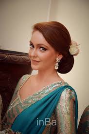Bridesmaid What A Beautiful Low Bun With Real Flower Gajra Care However Should Be Taken Before A Indian Wedding Hairstyles Weding Hair Styles Ball Hairstyles