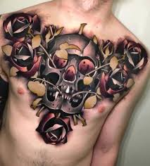 Chest tattoo of a rose. 50 Skull Rose Tattoos Meanings Tattoo Designs More