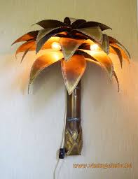The trunks are wrapped tightly with a brown plastic and the frowns already have the. Maison Jansen Palm Tree Wall Lamp Vintageinfo All About Vintage Lighting