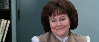 Women with flat chested dolls in the 1970s