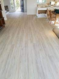 Wider View Of Install Lvp Coretec Plus Xl Enchancd In Everest Oak Luxury Vinyl Plank Flooring Luxury Vinyl Plank Diy Staircase Makeover