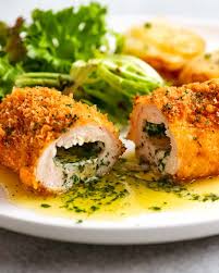 When the chicken thighs is cut at the thickest part and the juices run clear, the thighs are cooked through. Chicken Kiev Recipetin Eats
