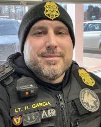 Lieutenant Helio Garcia was killed when his patrol car was struck by  another vehicle at approximately 11:30 p.m.