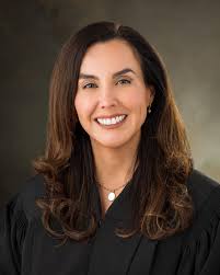 PRESIDING JUDGE LAURA SCOTT