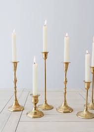 Candle holders for pillar, votive and tea light candles will add a feel of luxury, glamor, and glitz to any gold christmas tablescape. Gold Metal Candlestick Holder Centerpieces Afloral Com Gold Candle Sticks Cheap Wedding Table Centerpieces Wedding Table Centerpieces