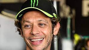 Valentino rossi background with the keywords bike, cool, motogp, motorcycle helmet, portrait. Rnbw9vce0pettm