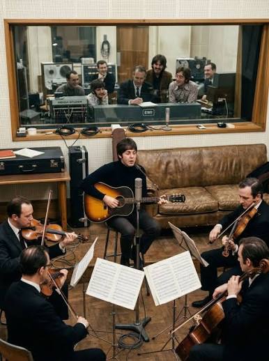 Paul McCartney records "Yesterday" with string quartet at Abbey Road Studios