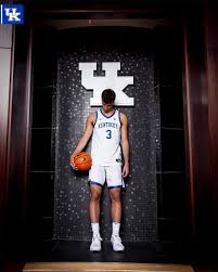 FIRST LOOK: Milan Momcilovic putting on the Kentucky uniform for the first  time. “Im going to bring a good positivity to the court, and a good  personality. I'm also going to bring