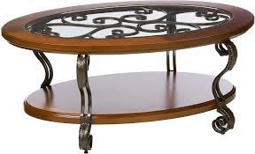 The frame and legs are made of hazelnut solids and veneers, coated. Buy Signature Design By Ashley Nestor Traditional Glass Top Oval Coffee Table W Fixed Shelf Medium Brown Online In Indonesia B004d05nau