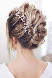 Wedding Updos Have Been The Top Hairstyle Picks Among Brides Of All Ages Worldwide Thi Wedding Hairstyles For Medium Hair Medium Hair Styles Wavy Wedding Hair