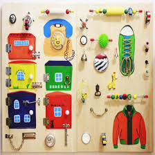 Developmental Board Tips And Ideas From Mom Toddler Activity Board Diy Busy Board Activity Board