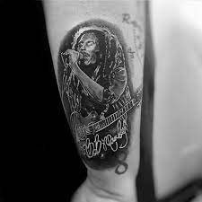 The reggae artist with the greatest impact in history, who introduced jamaican music to the world and changed the face of global pop music. 60 Bob Marley Tattoos For Men Jamaican Design Ideas