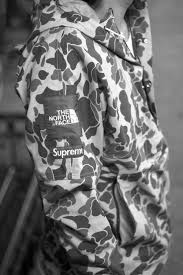Black And Grey Camo North Face Jacket The North Face X Supreme Camo Windbreaker Jacket Supreme Clothing Mens Outfits Fashion