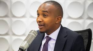 Gladys Wanga points figures at opponents after her billboard was vandalized  in Oyugis