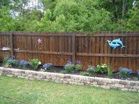 Find 37 practical, affordable and good looking often overlooked, lawn and flower bed edging can play an important role in your landscape design the contrast of light and dark stones along with different sizes complement each other quite well next. 39 Flower Beds In Front Of Fence Ideas Garden Design Outdoor Gardens Backyard Landscaping