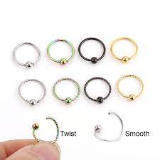 The back is a flat metal circle if that helps and i don't have time to go all the way to the piercing shop and ask them to clean it for me, because i live 40 mins away. 4 Stucke 20g X 8mm Ball End Hoop Bcr Twist Captive Bead Ring Fur Ohr Nase Nasenloch Septum Ring Helix Knorpel Piercing Schmuck Body Jewelry Aliexpress