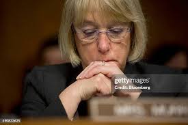 Daniel Dellinger, national commander of the American Legion, listens...  News Photo