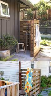 The showerhead next to green palm brings a resort feel to this beautiful outdoor room. 32 Beautiful Easy Diy Outdoor Shower Ideas A Piece Of Rainbow