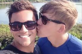 Tom Daley's husband Dustin Lance Black hits back at homophobic radio caller  who tells him 'two blokes can't bring up a baby'