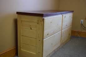 Our rustic file cabinets are uniquely designed, functional, affortable and will look great in your home office. Custom Made 4 Drawer Credenza File Cabinet In Knotty Pine With Concrete Countertop By Katt Design And Carpentry Llc Custommade Com