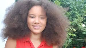 Teen with Down's syndrome donates five feet of hair to charity