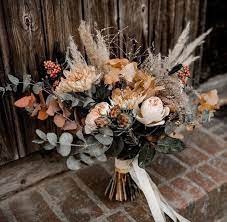 A budget of £850 should give you room to include a statement piece at the wedding. Boho Bohemio Rustico Fall Wedding Bouquets Fall Wedding Flowers Fall Bouquets