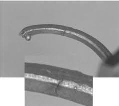 Fractured Co-Cr specimen tested under 0.50 mm preset deflection with...