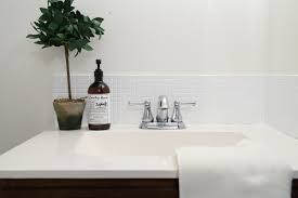 Bathroom backsplashes may be the unsung heroes of the simple bathroom design world. Updated Bathroom Tile Backsplash Diy With Paint