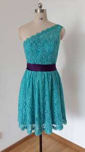 One Shoulder Teal Lace Short Bridesmaid Dress With Dark Purple Sash Short Lace Bridesmaid Dresses One Shoulder Bridesmaid Dresses Teal Bridesmaid Dresses