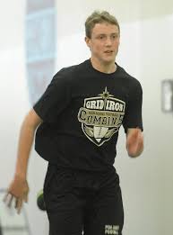 High school football players test skills at pro-style combine