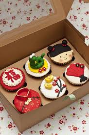 Desserts pay homage to chinese cuisine with an osmanthus gold jelly, a chinese new year macaroon and a white chocolate sesame cheesecake. Chinese New Year Cupcakes 2013 Chinese New Year Desserts New Year S Cupcakes Chinese New Year Cake