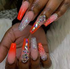 In this video i show how to do orange glitter and marble. Rhinestones Orange And Acrylic Image 6661546 On Favim Com
