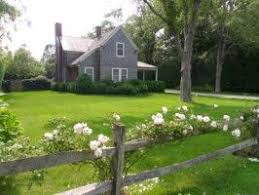 A split rail fence can provide a beautiful and casual accent along the borders of properties and yards. Split Rail Fence W Climbing Roses Backyard Landscaping Front Yard Landscaping Garden Spaces