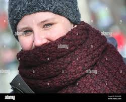 Sarah Acuff Chapman is bundled against the below freezing temperatures as  she walks