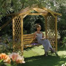 Check out the homebase selection of swing seats for the garden and add a touch of luxury to your outdoor space. Lattice Sided Wooden Garden Swing Arbour Seat From Westmount Living Westmount Living