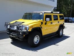 yellow hummer 2003 yellow hummer h2 suv i want one of these a long time from now when i have kids i would much rather drive th hummer cars hummer hummer h2 2003 yellow hummer h2 suv