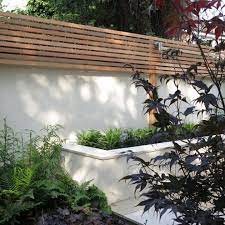 Maybe you would like to learn more about one of these? Fence On Top Of Rendered Wall Fencedesignposts Backyard Fences Lattice Fence Backyard